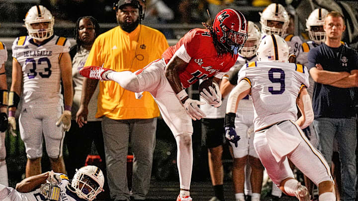 Orchard Lake St. Mary's wide receiver Bryson Williams makes a catch against Warren De La Salle during the first half at Orchard St. Mary's in West Bloomfield Township on Friday, September 13, 2024.