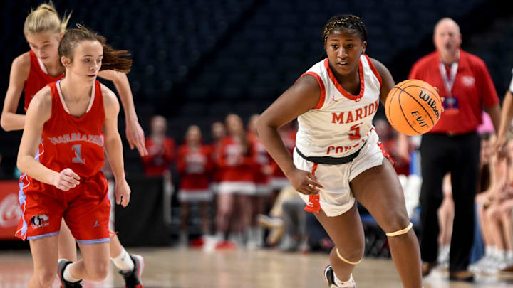 Marion County guard Serinity Metcalfe (5) steals the ball and brings it up with University Charter guard Ava Lacoste (1) pursuing during the state semifinal game Monday, Feb. 28, 2022, at Legacy Arena in Birmingham, Alabama.
University Charter Vs Marion County Ahsaa State Semifinal Marion County guard Serinity Metcalfe (5) steals the ball and brings it up with University Charter guard Ava Lacoste (1) pursuing during the state semifinal game Monday, Feb. 28, 2022, at Legacy Arena in Birmingham, Alabama.
University Charter Vs Marion County Ahsaa State Semifinal