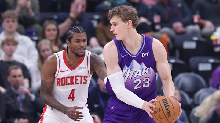 Feb 22, 2025; Salt Lake City, Utah, USA; Utah Jazz forward Lauri Markkanen (23) posts up against Houston Rockets guard Jalen Green (4) during the second half at Delta Center. Mandatory Credit: Rob Gray-Imagn Images Feb 22, 2025; Salt Lake City, Utah, USA; Utah Jazz forward Lauri Markkanen (23) posts up against Houston Rockets guard Jalen Green (4) during the second half at Delta Center. Mandatory Credit: Rob Gray-Imagn Images