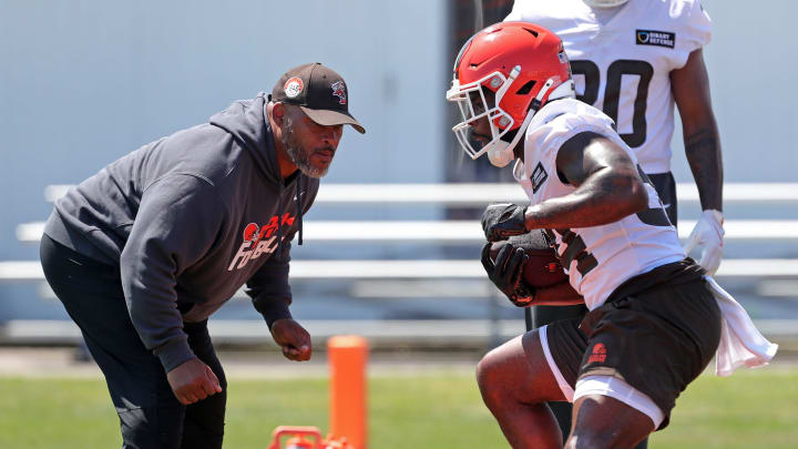 Browns running back Jerome Ford runs drills as running backs coach Duce Staley watches during minicamp, Wednesday, June 12, 2024, in Berea.