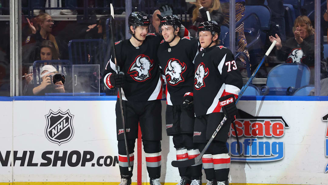 Jan 10, 2026; Buffalo, New York, USA;  Buffalo Sabres right wing Jack Quinn (22) celebrates his goal with teammates during the first period against the Anaheim Ducks at KeyBank Center. Mandatory Credit: Timothy T. Ludwig-Imagn Images