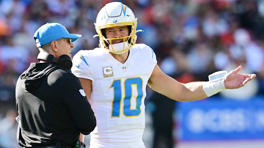 Justin Herbert was sometimes too conservative under Jim Harbaugh, and it didn’t help that he struggled in the playoffs, throwing four interceptions in the wild-card loss to the Texans. | Ken Blaze-Imagn Images