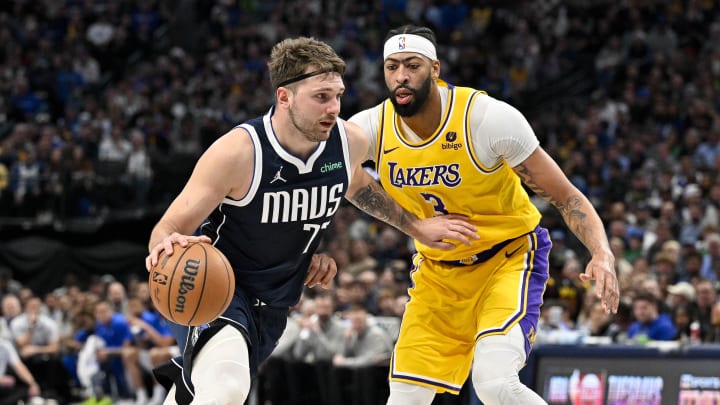 Dec 12, 2023; Dallas, Texas, USA; Dallas Mavericks guard Luka Doncic (77) and Los Angeles Lakers forward Anthony Davis (3) in action during the game between the Dallas Mavericks and the Los Angeles Lakers at the American Airlines Center. Mandatory Credit: Jerome Miron-USA TODAY Sports