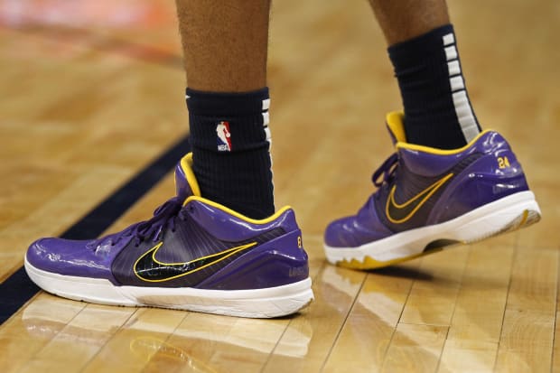 Kobe Bryant's purple Nike sneakers.