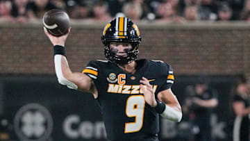 Sep 20, 2025; Columbia, Missouri, USA; Missouri Tigers quarterback Beau Pribula (9) throws a pass against the South Carolina Gamecocks during the second half of the game at Faurot Field at Memorial Stadium. Mandatory Credit: Denny Medley-Imagn Images