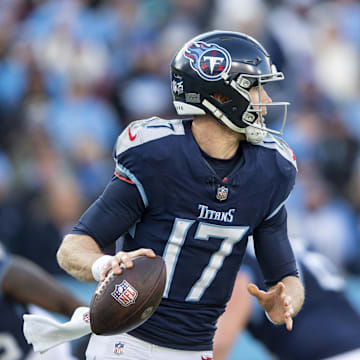 Jan 7, 2024; Nashville, Tennessee, USA;  Tennessee Titans quarterback Ryan Tannehill (17) rolls out against the Jacksonville Jaguars during the second half at Nissan Stadium. Mandatory Credit: Steve Roberts-Imagn Images