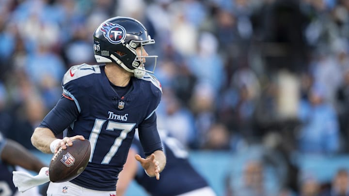 Jan 7, 2024; Nashville, Tennessee, USA;  Tennessee Titans quarterback Ryan Tannehill (17) rolls out against the Jacksonville Jaguars during the second half at Nissan Stadium. Mandatory Credit: Steve Roberts-Imagn Images