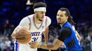 Jan 19, 2022; Philadelphia, Pennsylvania, USA; Philadelphia 76ers guard Seth Curry (31) dribbles past Orlando Magic guard Cole Anthony (50) during the first quarter at Wells Fargo Center. Mandatory Credit: Bill Streicher-Imagn Images
