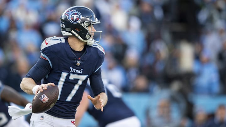 Jan 7, 2024; Nashville, Tennessee, USA;  Tennessee Titans quarterback Ryan Tannehill (17) rolls out against the Jacksonville Jaguars during the second half at Nissan Stadium. Mandatory Credit: Steve Roberts-Imagn Images