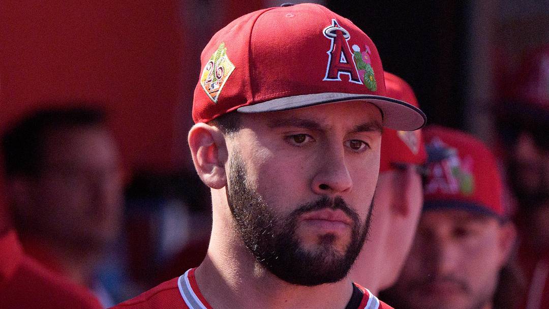 Feb 24, 2026; Tempe, Arizona, USA; Los Angeles Angels pitcher Grayson Rodriguez (21) reacts in the dugout with his team after being relieved in the second inning against the San Francisco Giants during a spring training game at Tempe Diablo Stadium. Mandatory Credit: Allan Henry-Imagn Images