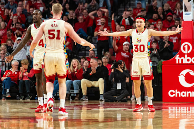 Nebraska Cornhuskers guard Keisei Tominaga (30) celebrates after a 3-point shot against the Michigan Wolverines.