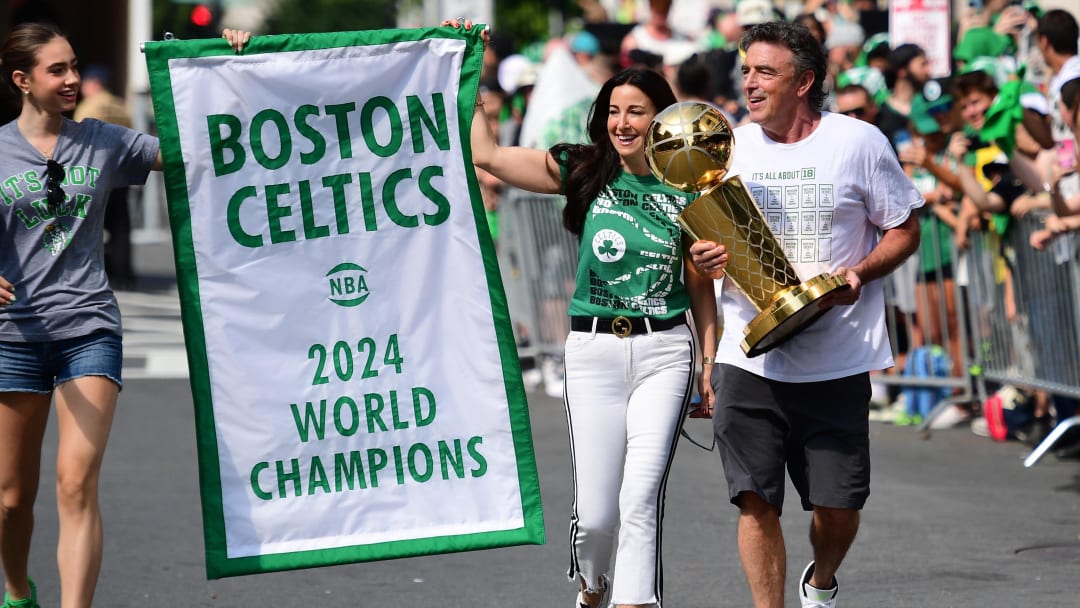 Jun 21, 2024; Boston, MA, USA;  Boston Celtics majority owner Wyc Grousbeck holds the Larry O'Brien trophy prior to the Boston Celtics championship parade. Mandatory Credit: Bob DeChiara-USA TODAY Sports