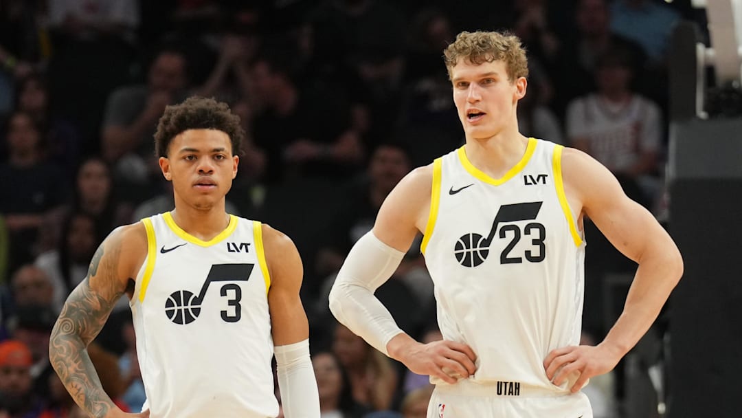 Feb 7, 2025; Phoenix, Arizona, USA; Utah Jazz guard Keyonte George (3) and Utah Jazz forward Lauri Markkanen (23) look on against the Phoenix Suns during the first half at Footprint Center. Mandatory Credit: Joe Camporeale-Imagn Images