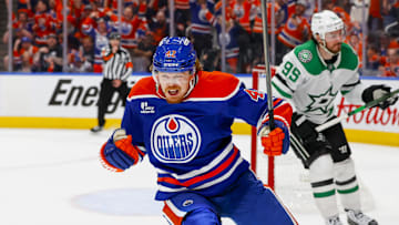 Edmonton Oilers right wing Kasperi Kapanen (42) celebrates after he scores an empty net goal to seal the Oilers victory over the Dallas Stars