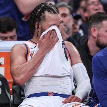 May 10, 2025; New York, New York, USA; New York Knicks guards Miles McBride (2) and Jalen Brunson (11) sit on the bench in the closing minute of the fourth quarter against the Boston Celtics during game three of the second round for the 2025 NBA Playoffs at Madison Square Garden. Mandatory Credit: Wendell Cruz-Imagn Images