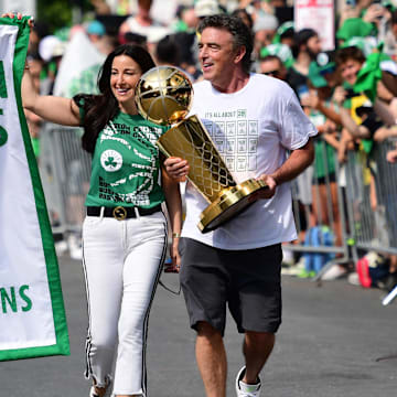 Jun 21, 2024; Boston, MA, USA;  Boston Celtics majority owner Wyc Grousbeck holds the Larry OíBrien trophy prior to the Boston Celtics championship parade. Mandatory Credit: Bob DeChiara-Imagn Images