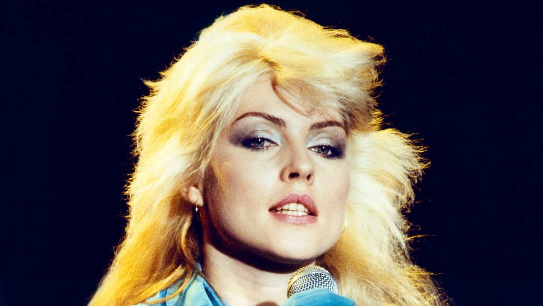 Debbie Harry of Blondie holding microphone