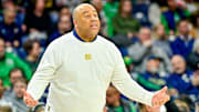 Mar 8, 2025; South Bend, Indiana, USA; Notre Dame Fighting Irish head coach Micah Shrewsberry talks to his players in the first half against the Cal Bears at the Purcell Pavilion. Mandatory Credit: Matt Cashore-Imagn Images