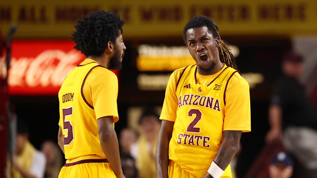 Feb 28, 2026; Tempe, Arizona, USA; Arizona State Sun Devils guard Anthony Johnson (2) celebrates with guard Maurice Odum (5) against the Utah Utes in the second half at Desert Financial Arena. Mandatory Credit: Mark J. Rebilas-Imagn Images