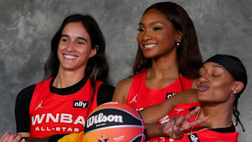 Washington Mystics' Sonia Citron, Brittney Sykes, and Kiki Iriafen take a photo before the 2025 WNBA All-Star Game 