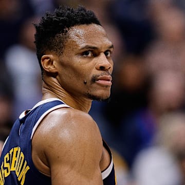Jan 15, 2025; Denver, Colorado, USA; Denver Nuggets guard Russell Westbrook (4) reacts in the third quarter against the Houston Rockets at Ball Arena. Mandatory Credit: Isaiah J. Downing-Imagn Images