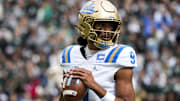 Oct 11, 2025; East Lansing, Michigan, USA; UCLA Bruins quarterback Nico Iamaleava (9) looks for an open receiver in the second quarter at Spartan Stadium. Mandatory Credit: Brendan Mullin-Imagn Images