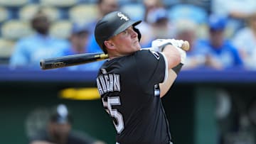 May 8, 2025; Kansas City, Missouri, USA; Chicago White Sox first baseman Andrew Vaughn (25) hits a double during the fifth inning against the Kansas City Royals at Kauffman Stadium. 