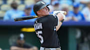 Chicago White Sox first baseman Andrew Vaughn (25) hits a double against the Kansas City Royals at Kauffman Stadium. 
