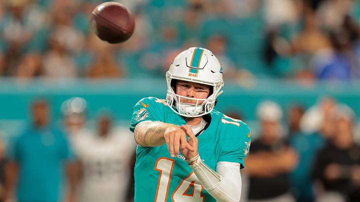 Aug 23, 2025; Miami Gardens, Florida, USA; Miami Dolphins quarterback Quinn Ewers (14) passes the football against the Jacksonville Jaguars during the fourth quarter at Hard Rock Stadium. Mandatory Credit: Sam Navarro-Imagn Images