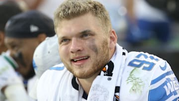 Detroit Lions defensive end Aidan Hutchinson (97) reacts on the sidelines against the Pittsburgh Steelers during the fourth quarter at Acrisure Stadium.