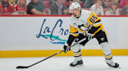Oct 23, 2025; Sunrise, Florida, USA; Pittsburgh Penguins defenseman Erik Karlsson (65) moves the puck against the Florida Panthers during the first period at Amerant Bank Arena. Mandatory Credit: Sam Navarro-Imagn Images