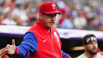 May 21, 2025; Denver, Colorado, USA; Philadelphia Phillies manager Rob Thomson (59) celebrates a run scored in the first inning against the Colorado Rockies at Coors Field.