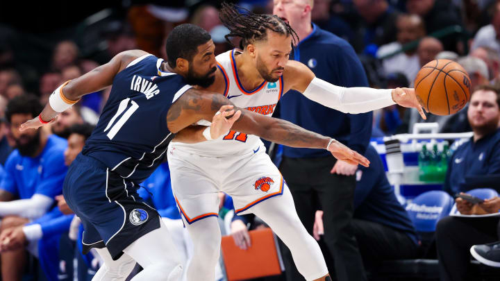 Jan 11, 2024; Dallas, Texas, USA;  Dallas Mavericks guard Kyrie Irving (11) knocks the ball away from New York Knicks guard Jalen Brunson (11) during the second half at American Airlines Center. Mandatory Credit: Kevin Jairaj-USA TODAY Sports