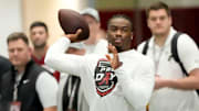 Mar 19, 2025; Tuscaloosa AL, USA; Quarterback Jalen Milroe throws for scouts at the University of Alabama Pro Day as several Crimson Tide players worked out for NFL teams in the Hank Crisp Indoor Practice Facility.