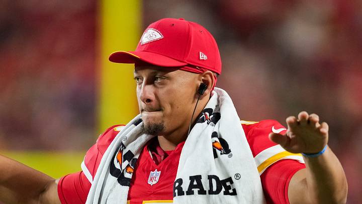 Kansas City Chiefs quarterback Patrick Mahomes (15) quiets the crowd