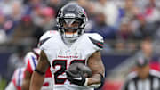 Oct 13, 2024; Foxborough, Massachusetts, USA; Houston Texans running back Joe Mixon (28) runs with the ball against the New England Patriots during the first half at Gillette Stadium. Mandatory Credit: Gregory Fisher-Imagn Images