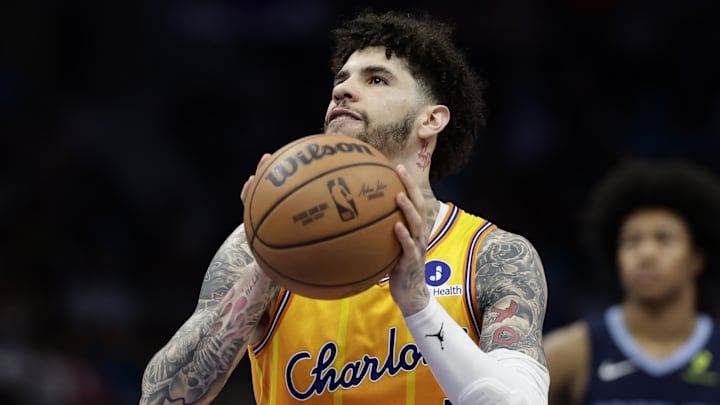 Mar 21, 2026; Charlotte, North Carolina, USA; Charlotte Hornets guard LaMelo Ball (1) takes a technical foul free throw during the second half against the Memphis Grizzlies at Spectrum Center. Mandatory Credit: Brian Westerholt-Imagn Images