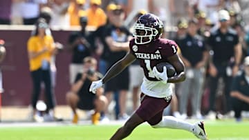 Oct 5, 2024; College Station, Texas, USA; Texas A&M Aggies wide receiver Jabre Barber (1) runs the ball in the first half against the Missouri Tigers at Kyle Field. Mandatory Credit: Maria Lysaker-Imagn Images. 