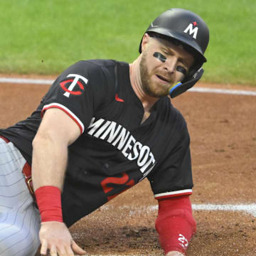 Minnesota Twins catcher Ryan Jeffers (27) scores in the third inning against the Cleveland Guardians at Progressive Field in Cleveland on Sept. 17, 2024.