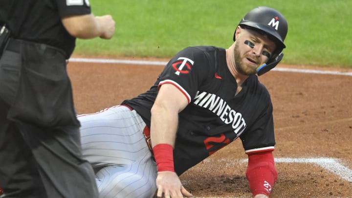 Minnesota Twins catcher Ryan Jeffers (27) scores in the third inning against the Cleveland Guardians at Progressive Field in Cleveland on Sept. 17, 2024.