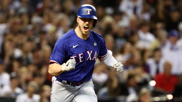 Nov 1, 2023; Phoenix, Arizona, USA; Texas Rangers catcher Mitch Garver (18) reacts 