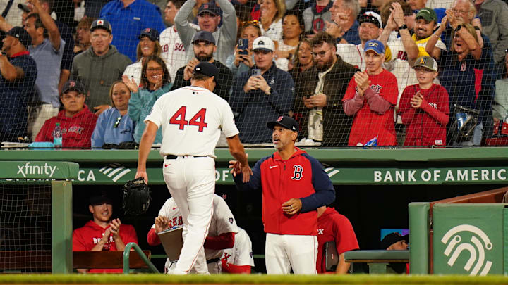 Aug 29, 2024; Boston, Massachusetts, USA; Boston Red Sox relief pitcher Rich Hill (44) is congratulated by manager Alex Cora (13) after ending the eighth inning with a strikeout against the Toronto Blue Jays at Fenway Park. Aug 29, 2024; Boston, Massachusetts, USA; Boston Red Sox relief pitcher Rich Hill (44) is congratulated by manager Alex Cora (13) after ending the eighth inning with a strikeout against the Toronto Blue Jays at Fenway Park.