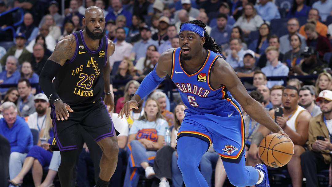 Apr 2, 2026; Oklahoma City, Oklahoma, USA; Oklahoma City Thunder guard Luguentz Dort (5) drives around Los Angeles Lakers forward LeBron James (23) during the second half at Paycom Center. Mandatory Credit: Alonzo Adams-Imagn Images Apr 2, 2026; Oklahoma City, Oklahoma, USA; Oklahoma City Thunder guard Luguentz Dort (5) drives around Los Angeles Lakers forward LeBron James (23) during the second half at Paycom Center. Mandatory Credit: Alonzo Adams-Imagn Images