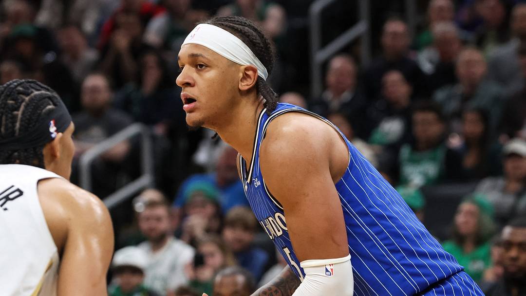 Apr 12, 2026; Boston, Massachusetts, USA; Orlando Magic forward Paolo Banchero (5) looks to pass during the first half against the Boston Celtics at TD Garden. Mandatory Credit: Paul Rutherford-Imagn Images