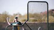 February 23, 2011; Phoenix, AZ, USA; Justine Siegal pitches batting practice during spring training for the Oakland Athletics at Papago Park Baseball Complex.