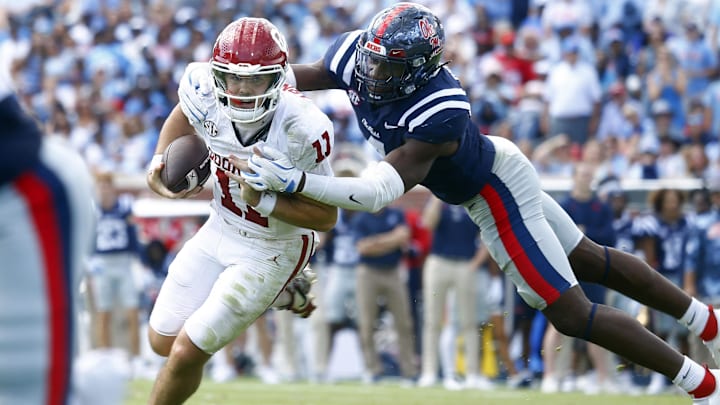 Ole MIss's Suntarine Perkins runs down Oklahoma's Jackson Arnold for a sack. Ole MIss's Suntarine Perkins runs down Oklahoma's Jackson Arnold for a sack.
