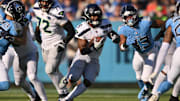 Nov 23, 2025; Nashville, Tennessee, USA; Seattle Seahawks running back Kenneth Walker III (9) runs against the Tennessee Titans during the second half at Nissan Stadium. Mandatory Credit: Steve Roberts-Imagn Images