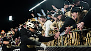Purdue Boilermakers defensive lineman Isaiah Nichols (93) celebrates with fans 