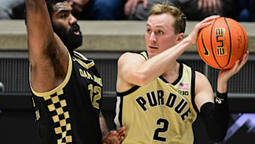 Purdue Boilermakers guard Fletcher Loyer (2) looks to pass the ball
