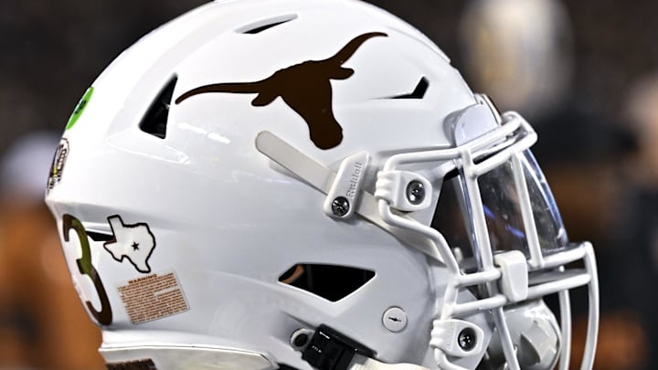 Nov 30, 2024; College Station, Texas, USA; A detail view of a Texas Longhorns helmet on the sideline during the first quarter against the Texas A&M Aggies. The Longhorns defeated the Aggies 17-7 at Kyle Field. Mandatory Credit: Maria Lysaker-Imagn Images  
